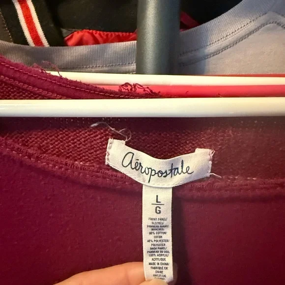 🍂 **Aéropostale Maroon Striped Back Sweatshirt**  
Size **Large - Picture 2 of 3